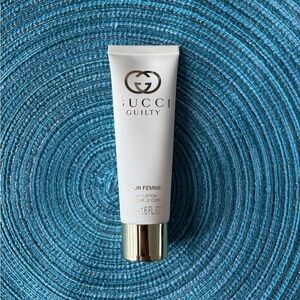Gucci Guilty Pour Femme Lotion - White & Gold Accents